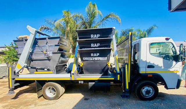 RAP skip truck side view at the depot