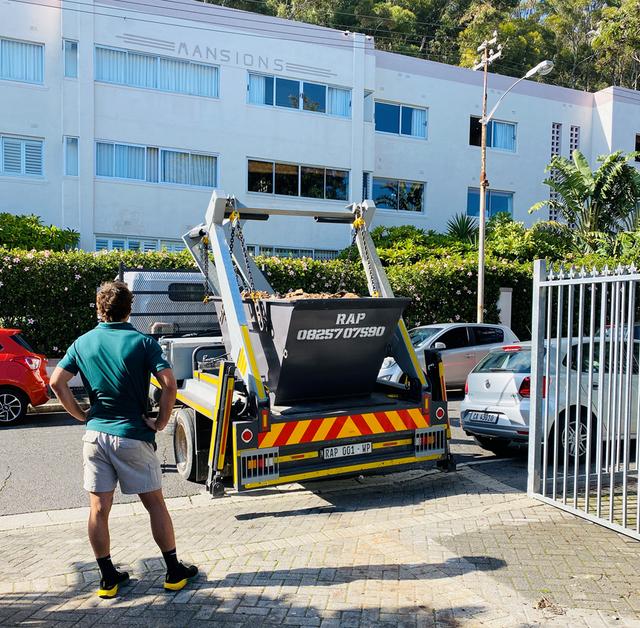 RAP skip being delivered at a complex gate entrance