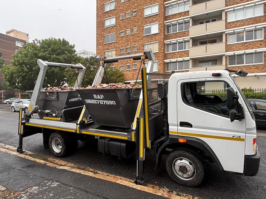 RAP skip truck carrying two skips on a Cape Town street